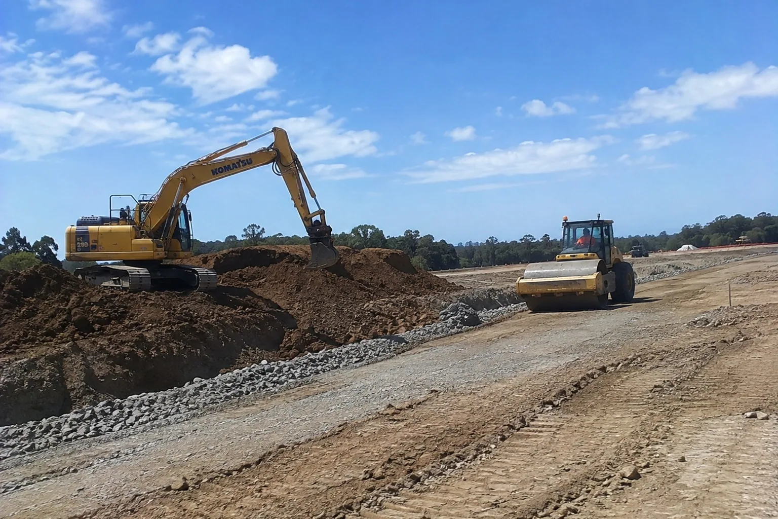 Earthmoving plant working a subdivision-scale Auckland site